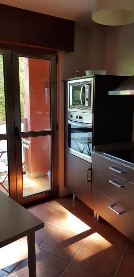 Apartamento Playa Meron ซาน บีเซนเต เด ลา บาร์เกรา ภายนอก รูปภาพ